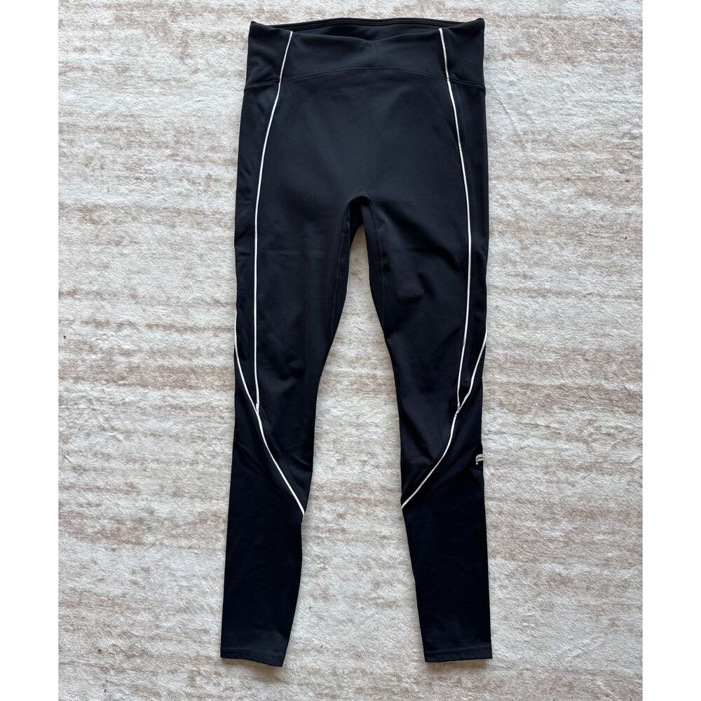 Fabletics Anywhere Motion365+ High-Waisted Piped Leggings Black White